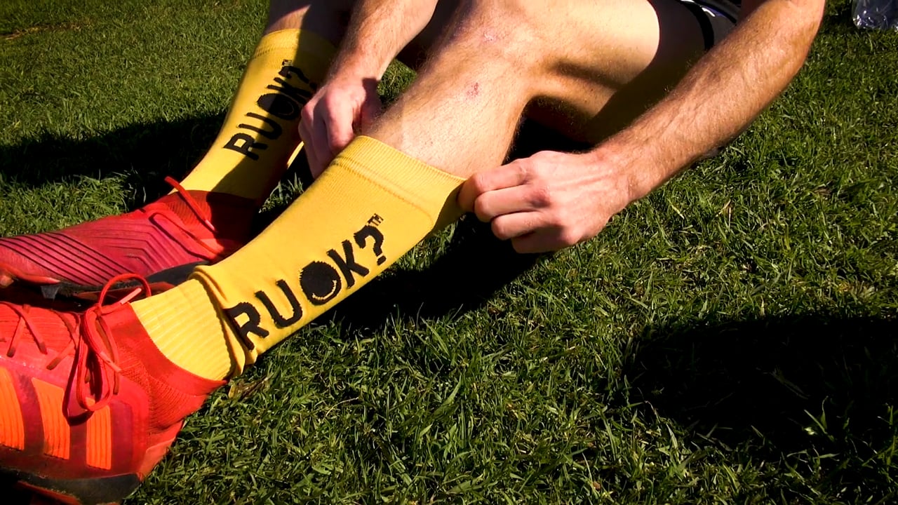 AFL players supporting R U OK? mental health campaign