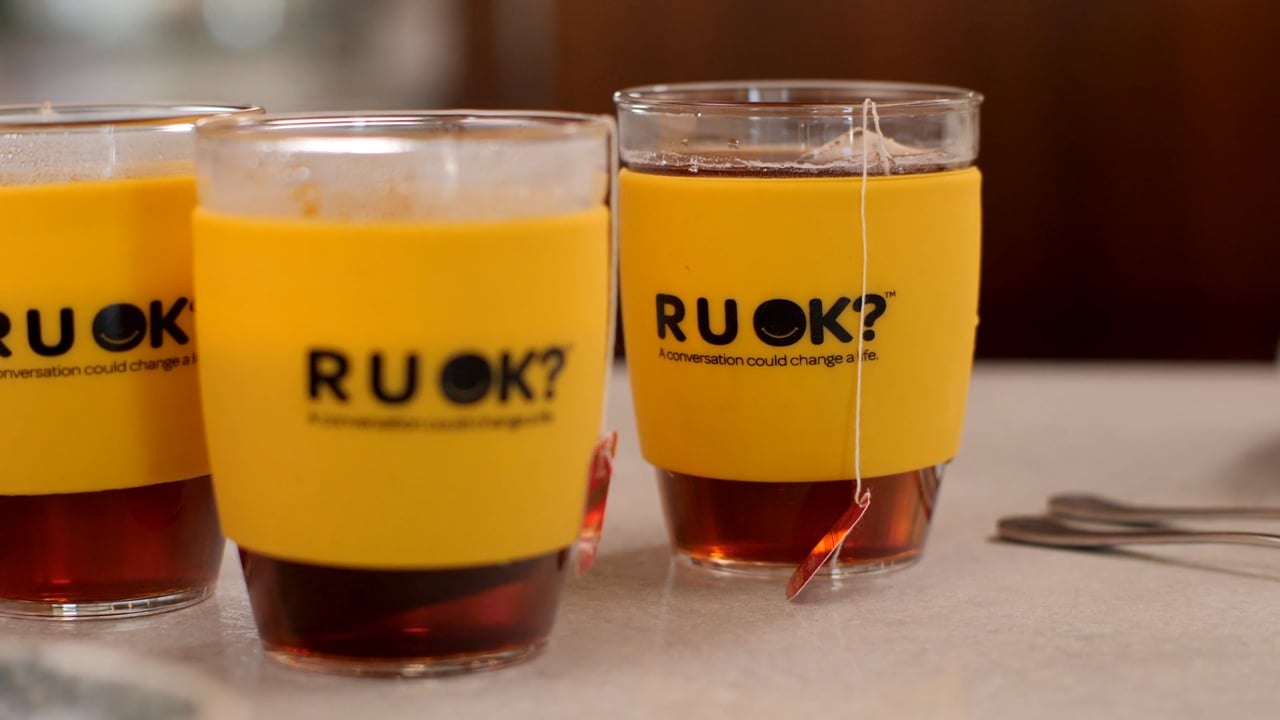 Colleagues sharing tea together in support of R U OK?
